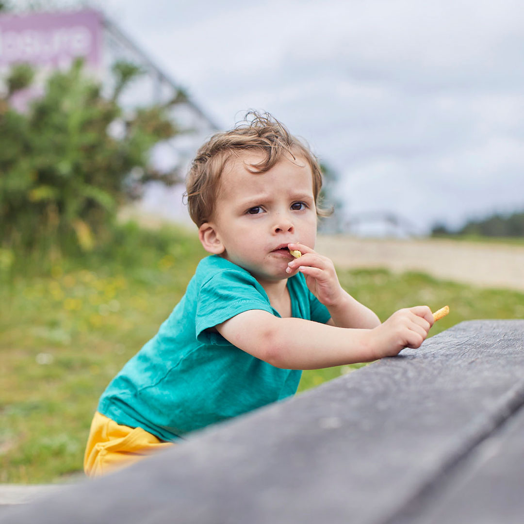 Boy eating Puff snacks