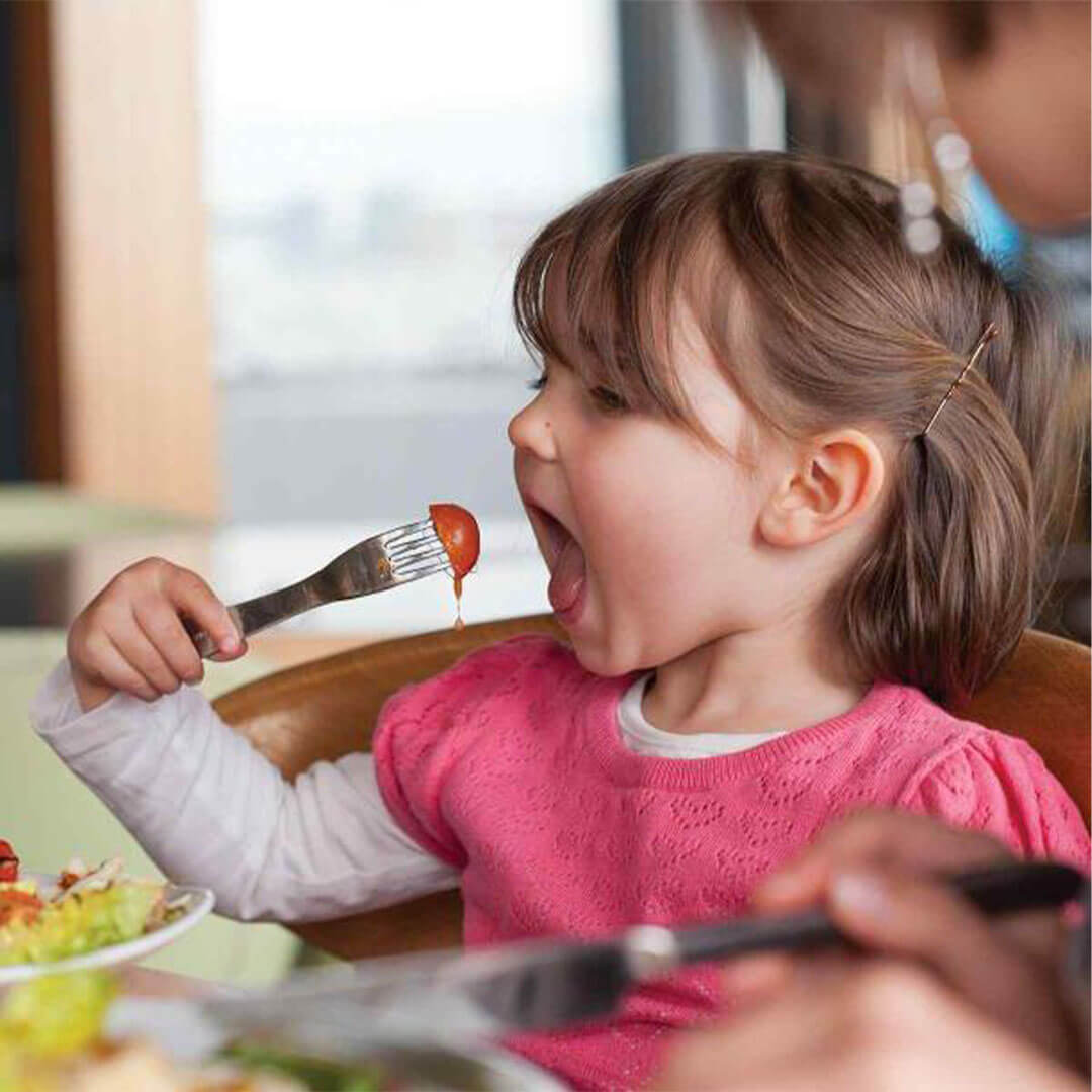 A toddler eating