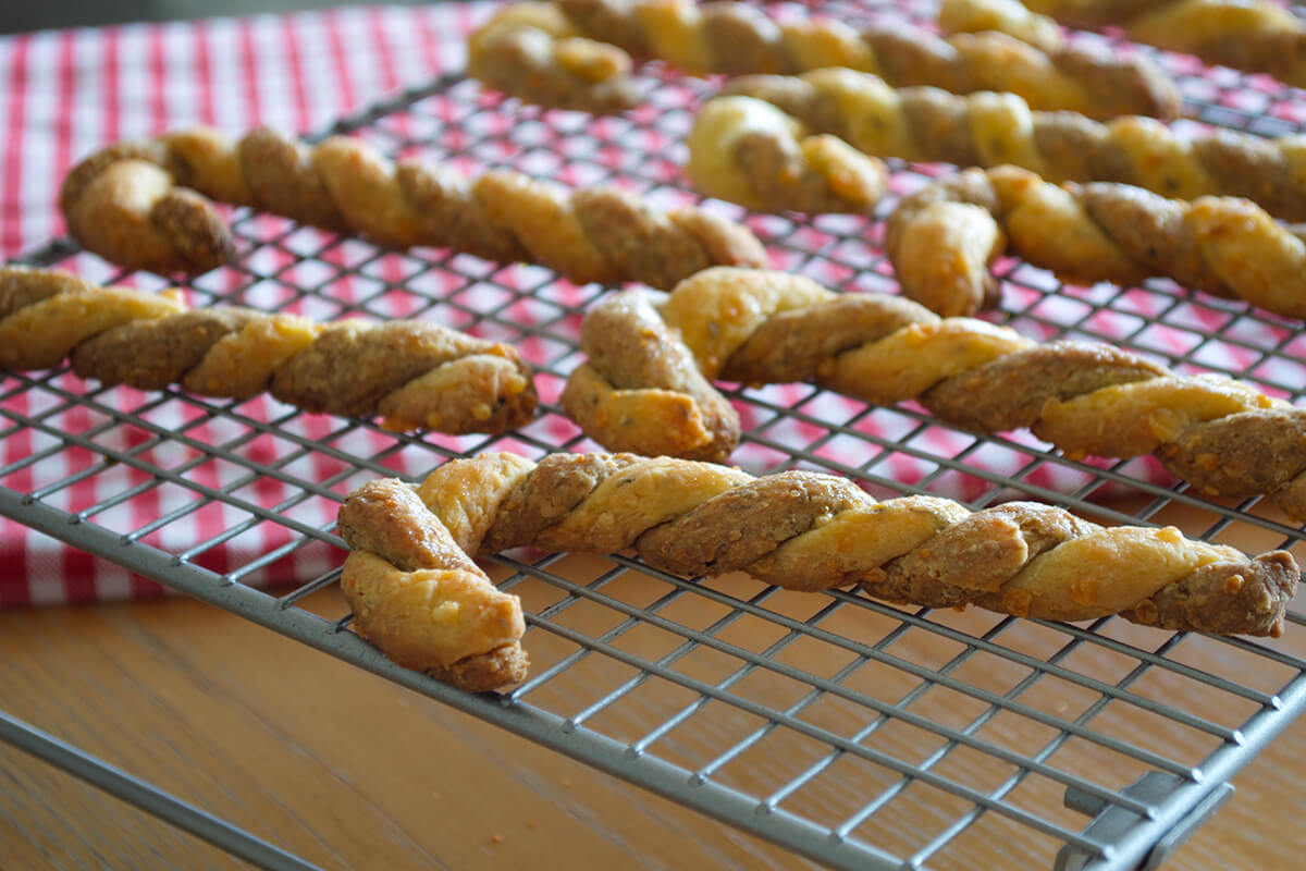 Cheese Straw Christmas Canes on a cooling rack