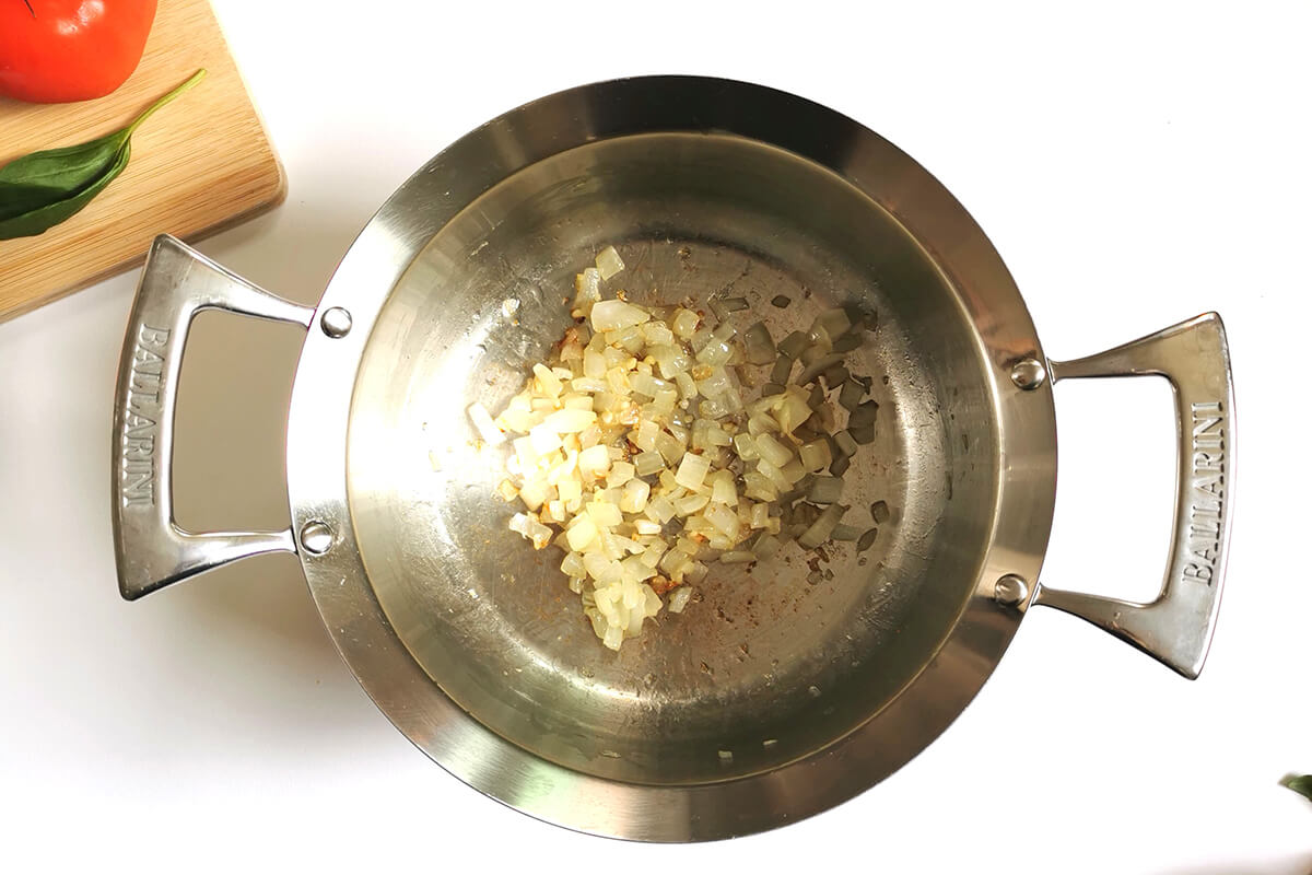 A saucepan of sauteed onions and garlic