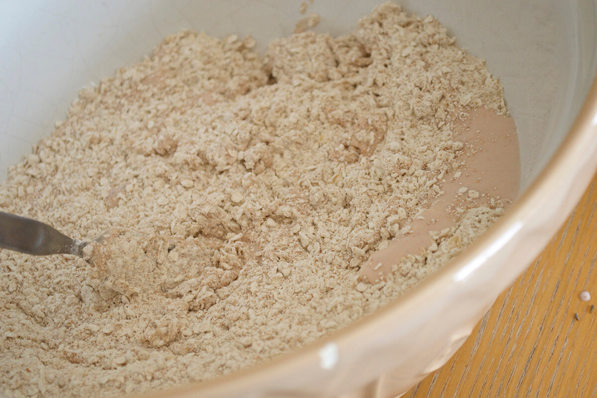 Strawberry muffin batter in a mixing bowl