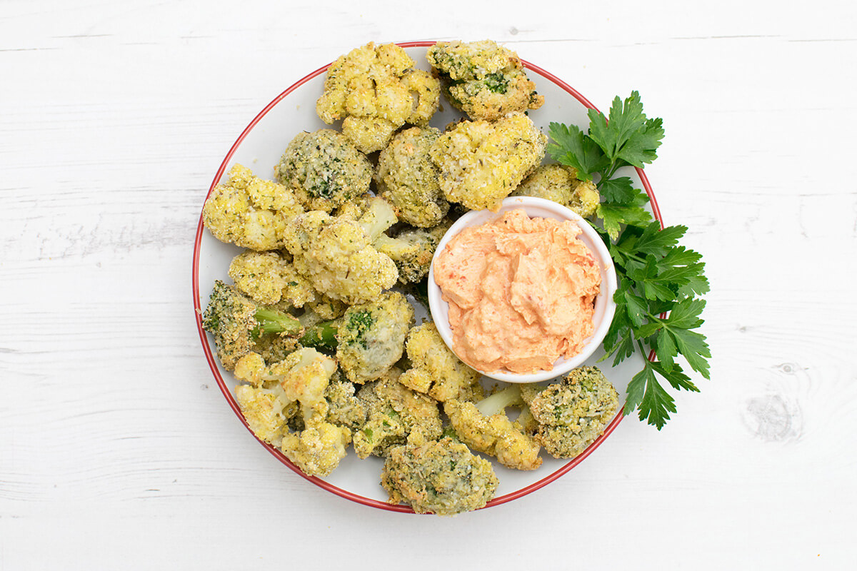 Crispy Cauliflower & Broccoli Bites with a cream cheese and red pepper dip