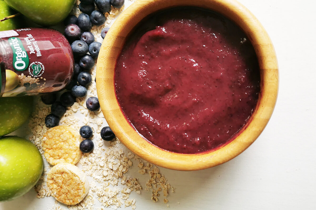 Organix apple, blueberry and oat jar emptied into bowl