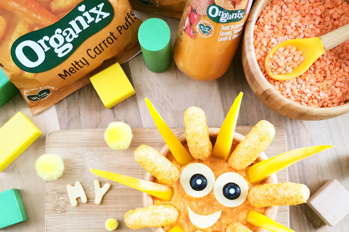 To complete the Organix sunshine fun plate, steamed yellow pepper are placed around the edge of the bowl, alternating with the melty carrot puffs