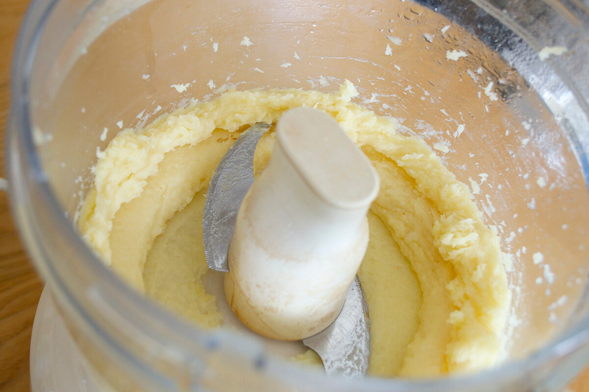 Parsnips being blended in a food processor
