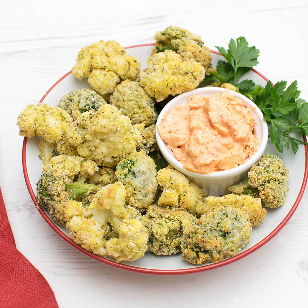 Crispy Cauliflower & Broccoli Bites with a cream cheese and red pepper dip