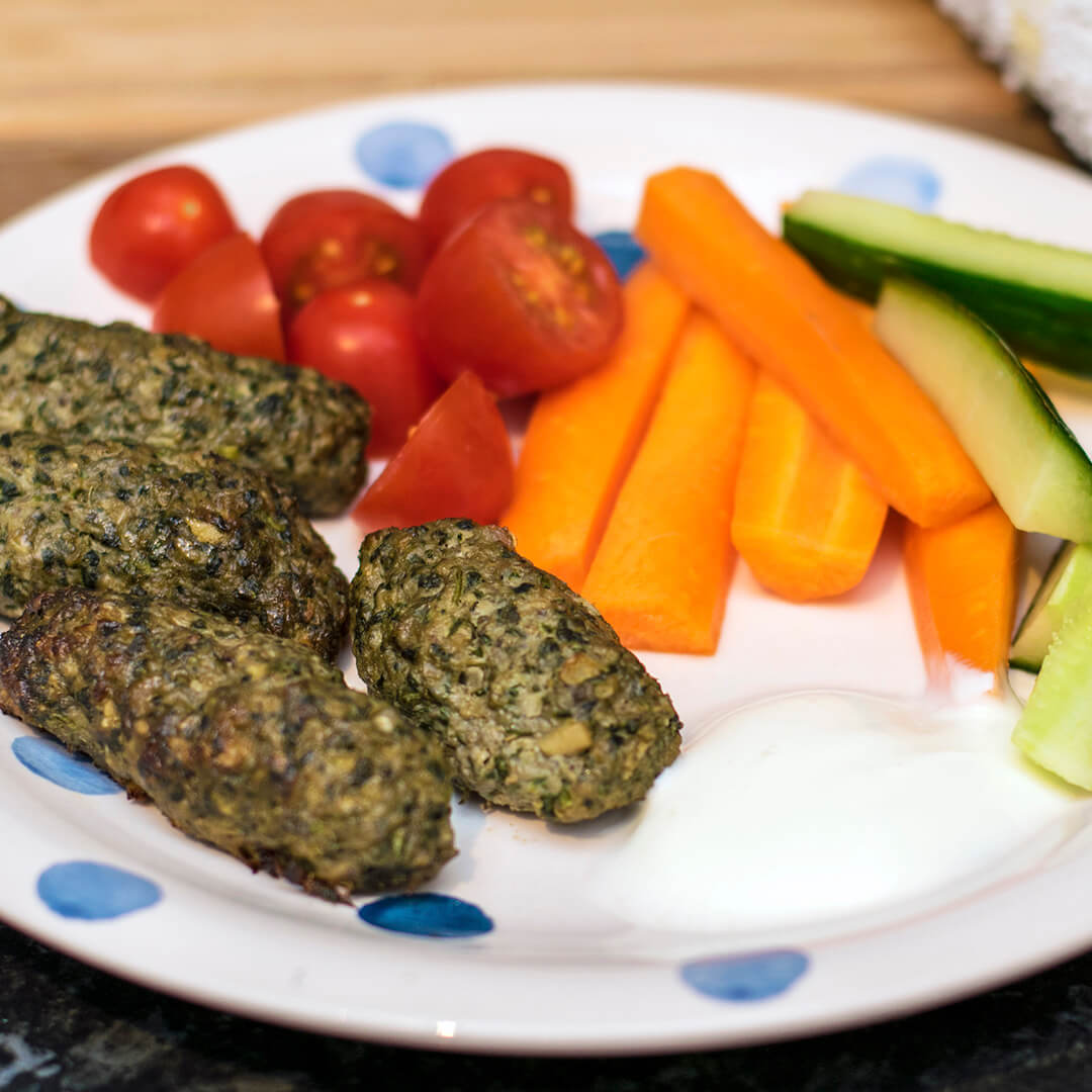 Lamb, Spinach & Mushroom Koftas served with cherry tomatoes, cucumber and carrot sticks