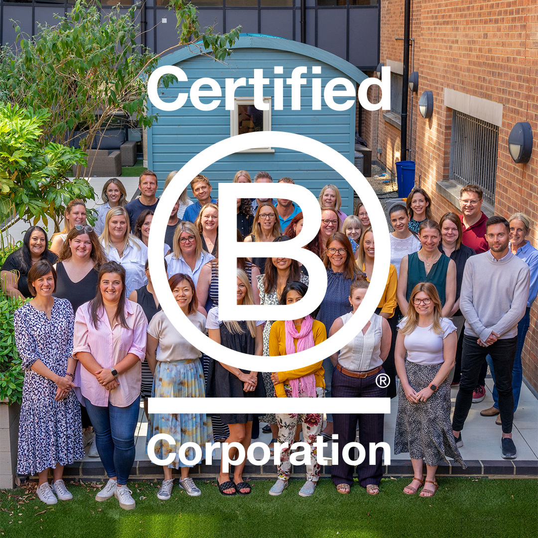 group of 30 people with certified B Corporation logo over the top